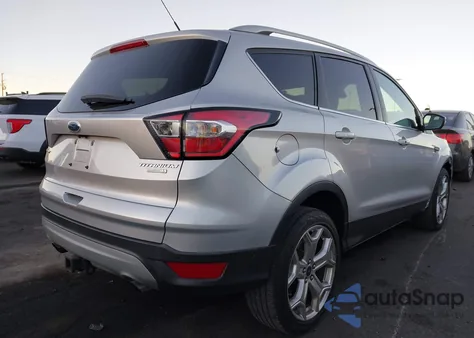 2017 Ford Escape Titanium z USA, uszkodzony, nr VIN 1FMCU0J94HUC80309